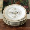 Lot de 6 assiettes plates dorée décor calèche attribué à Porcelaine du Berry par Hello Broc brocante en ligne