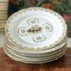 Lot de 6 assiettes plates dorée décor calèche attribué à Porcelaine du Berry par Hello Broc brocante en ligne