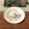 Assiette plate ancienne Terre de Fer décor Marguerite marron attribution Lunéville fin 19ème siècle par Hello Broc brocante en ligne