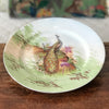 Assiette de collection murale en porcelaine de Limoges décor paons J.B.T & Cie début XXème siècle par Hello Broc brocante en ligne