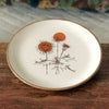 Assiette à dessert  vintage ADP mouchetées décor chardon années 70 diamètre 21 cm par Hello Broc brocante en ligne
