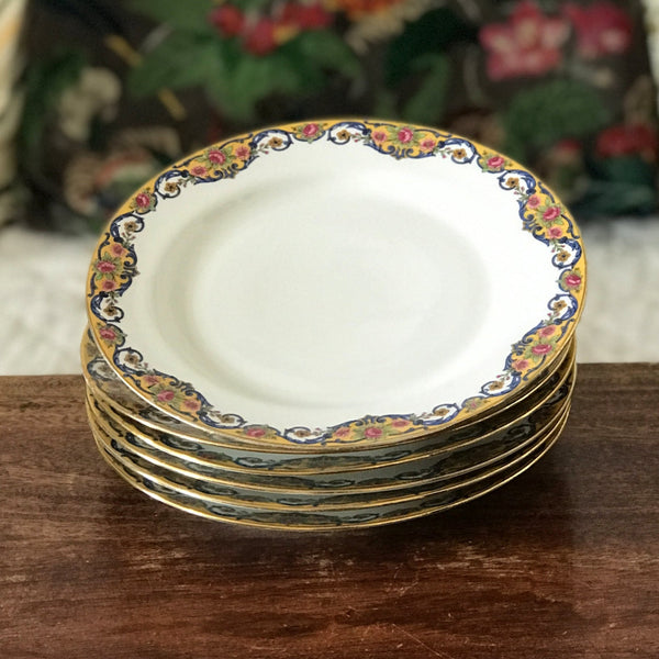 Lot de 6 assiettes à dessert en porcelaine de Limoges bordure jaune et fleurs multicolores par Hello Broc brocante en ligne