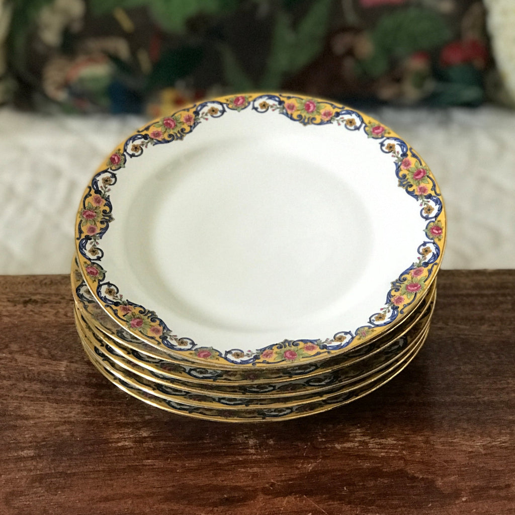 Lot de 6 assiettes à dessert en porcelaine de Limoges bordure jaune et fleurs multicolores par Hello Broc brocante en ligne