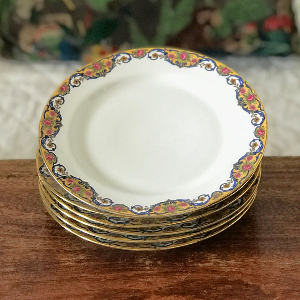 Lot de 6 assiettes à dessert en porcelaine de Limoges bordure jaune et fleurs multicolores par Hello Broc brocante en ligne