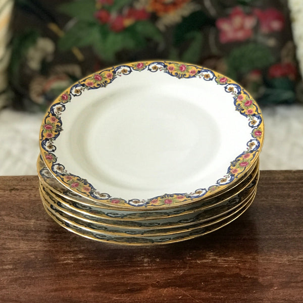 Lot de 6 assiettes à dessert en porcelaine de Limoges bordure jaune et fleurs multicolores par Hello Broc brocante en ligne