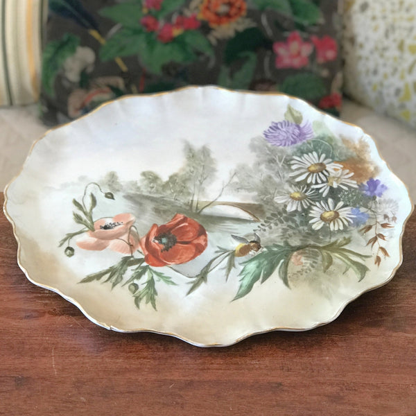 Grand plat en porcelaine de Limoges Jean Pouyat décor polychrome de fleurs peint à la main fin 19e début 20e siècle par Hello Broc brocante en ligne