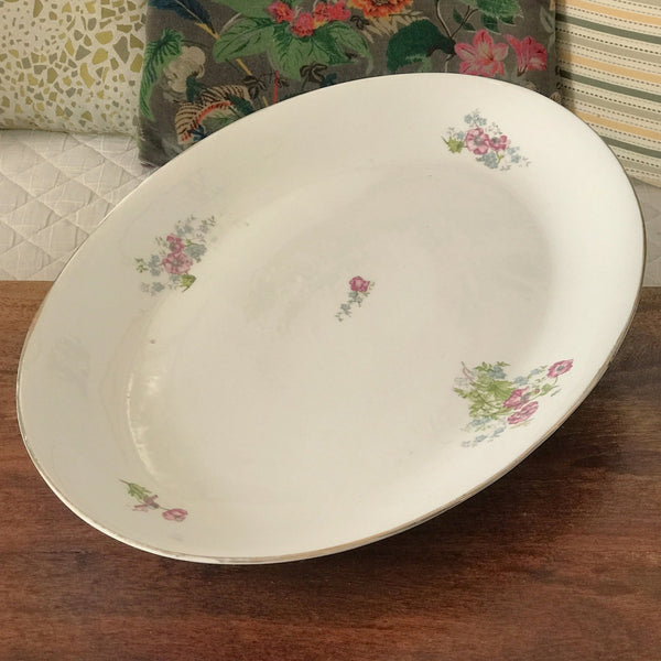 Très grand plat de service ovale et creux en porcelaine de Limoges P.L. 52 x 35 cm par Hello Broc brocante en ligne