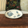 Plat de service ovale en faïence de Pexonne décor Oiseaux par Hello Broc brocante en ligne