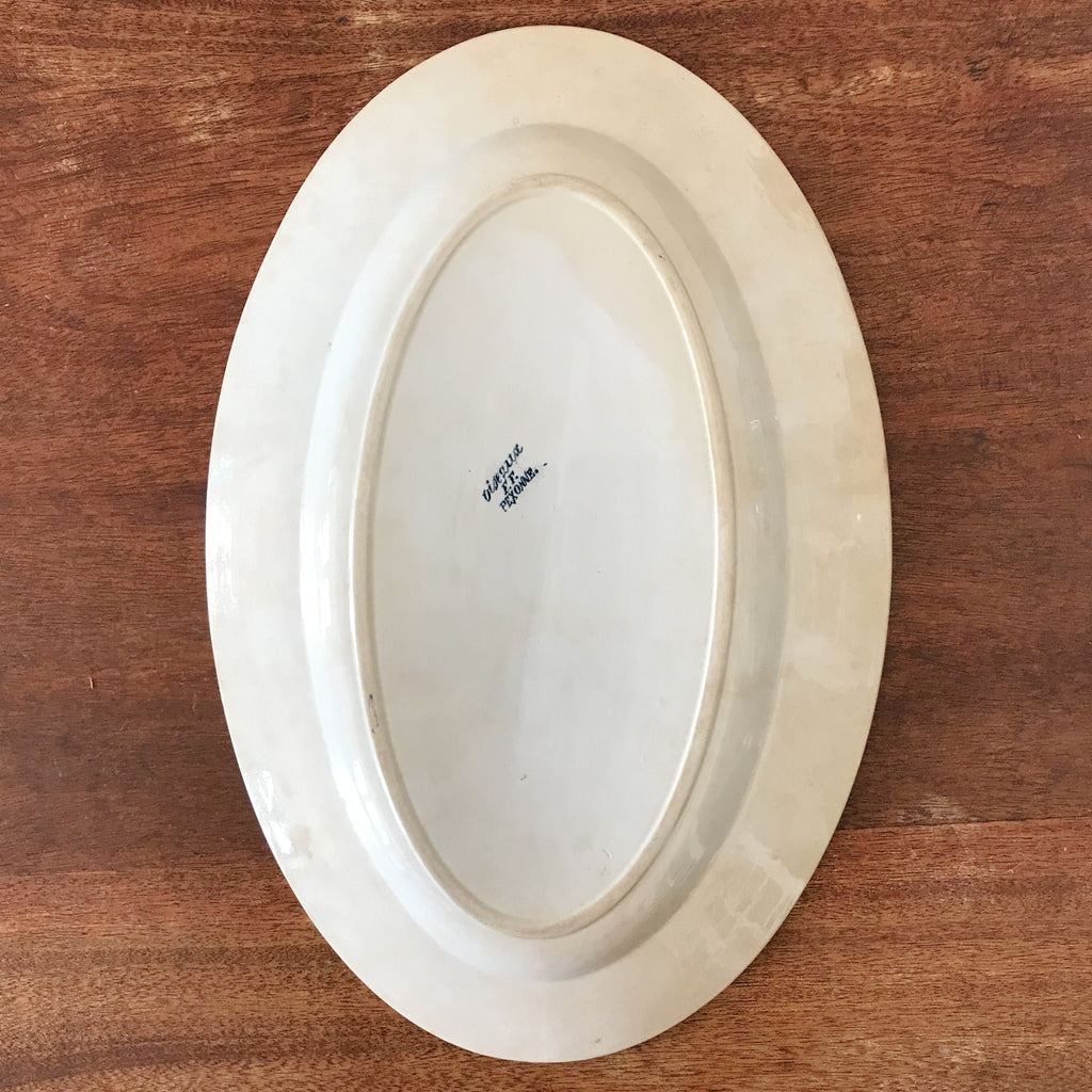Plat de service ancien forme ovale en faïence de Pexonne décor Oiseaux par Hello Broc brocante en ligne