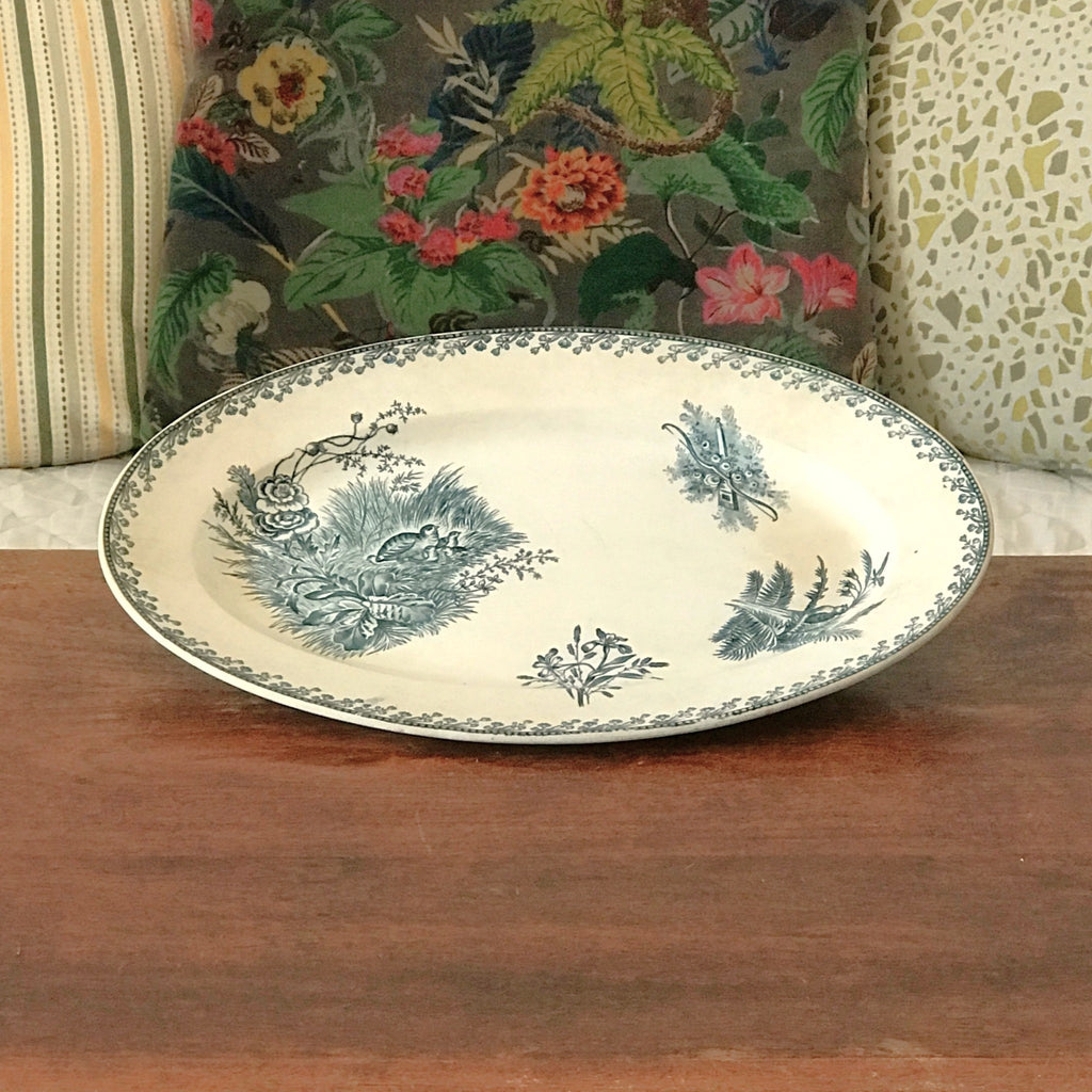 Plat de service ancien forme ovale en faïence de Pexonne décor Oiseaux par Hello Broc brocante en ligne