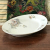 Grand plat de service ovale en porcelaine ULIM Limoges France à décor pavots par Hello Broc brocante en ligne