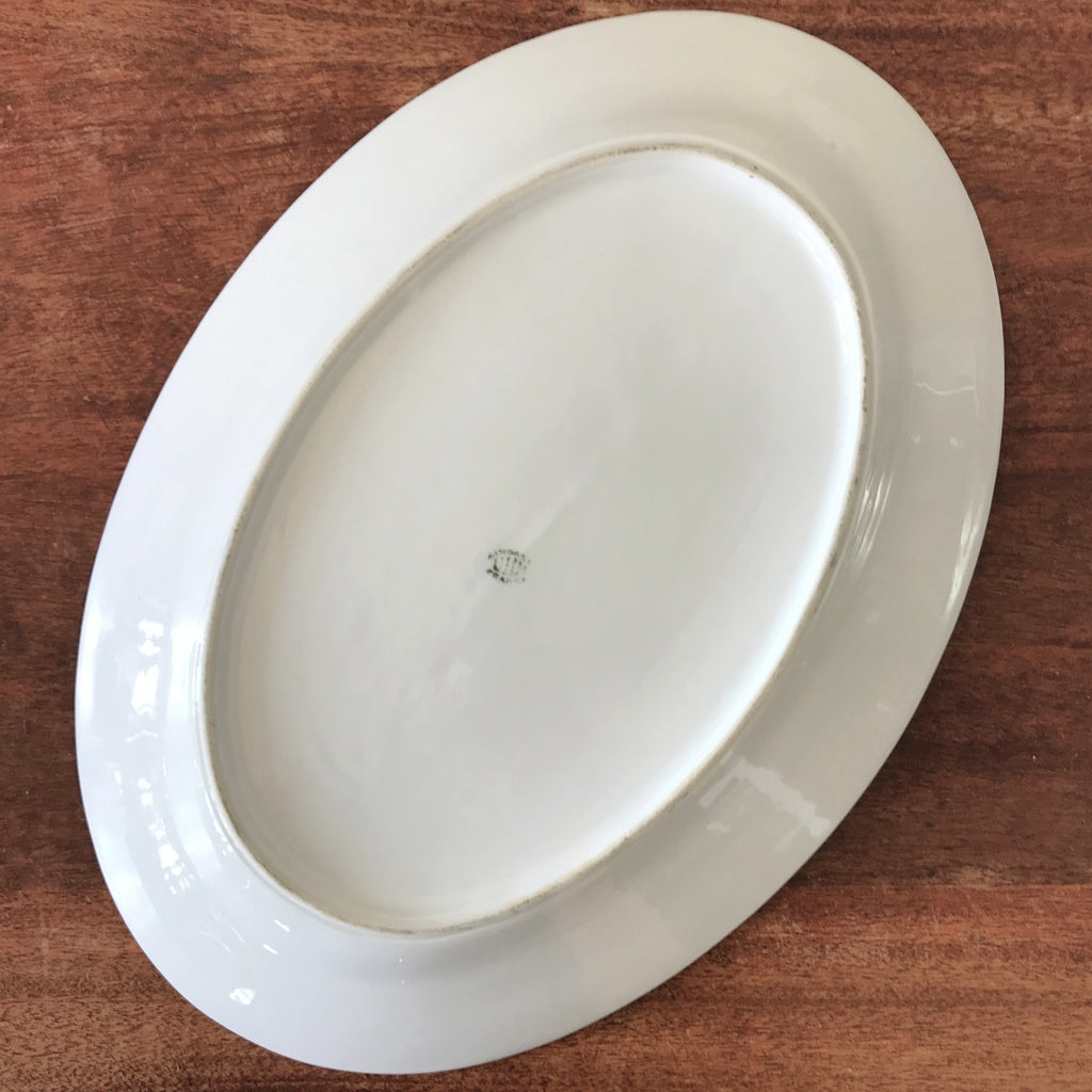 Grand plat de service ovale en porcelaine ULIM Limoges France à décor pavots par Hello Broc brocante en ligne