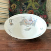 Plat rond et creux en porcelaine de Limoges décor pavots diamètre de 29 cm par Hello Broc brocante en ligne