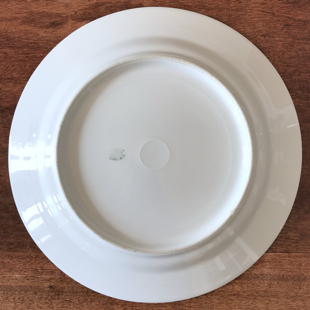 Plat rond légèrement creux en porcelaine de Limoges décor pavots diamètre de 29 cm