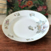 Grand plat rond légèrement creux en porcelaine de Limoges ULIM décor pavots diamètre de 31 cm par Hello Broc brocante en ligne