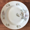 Grand plat rond légèrement creux en porcelaine de Limoges ULIM décor pavots diamètre de 31 cm par Hello Broc brocante en ligne