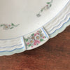 Plat de service ovale en porcelaine de Limoges Lanternier décor fleurs et bleu par Hello Broc brocante en ligne