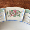 Plat de service rond en porcelaine de Limoges Lanternier décor fleurs et bleu diamètre de 33 cm par Hello Broc brocante en ligne