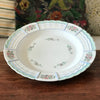 Plat de service rond en porcelaine de Limoges Lanternier décor fleurs et bleu diamètre de 33 cm par Hello Broc brocante en ligne