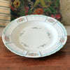 Plat de service rond en porcelaine de Limoges Lanternier décor fleurs et bleu diamètre de 33 cm par Hello Broc brocante en ligne