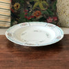 Plat de service rond en porcelaine de Limoges Lanternier décor fleurs et bleu diamètre de 33 cm par Hello Broc brocante en ligne