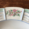Plat de service rond en porcelaine de Limoges Lanternier décor fleurs et bleu diamètre de 33 cm par Hello Broc brocante en ligne