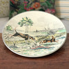 Grand plat de service rond Atelier d'Art Longwy Série La Chasse La Plaine par Hello Broc brocante en ligne