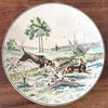 Grand plat de service rond Atelier d'Art Longwy Série La Chasse La Plaine par Hello Broc brocante en ligne