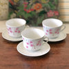 Ensemble 3 tasses à thé et 3 soucoupes décor torse en creux fleurs roses en faïence fine par Hello Broc brocante en ligne