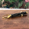 Pince crabe courte à sucre ou à glaçon manche bakélite détails dorés longueur 13 cm par Hello Broc brocante en ligne