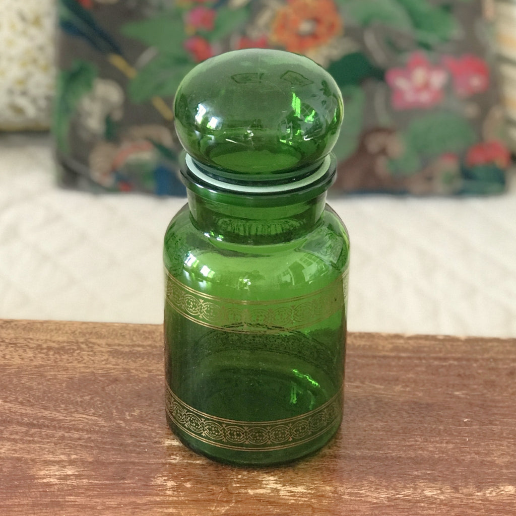Ancien bocal à café vintage en verre moulé vert et frises imprimées dorées par Hello Broc brocante en ligne