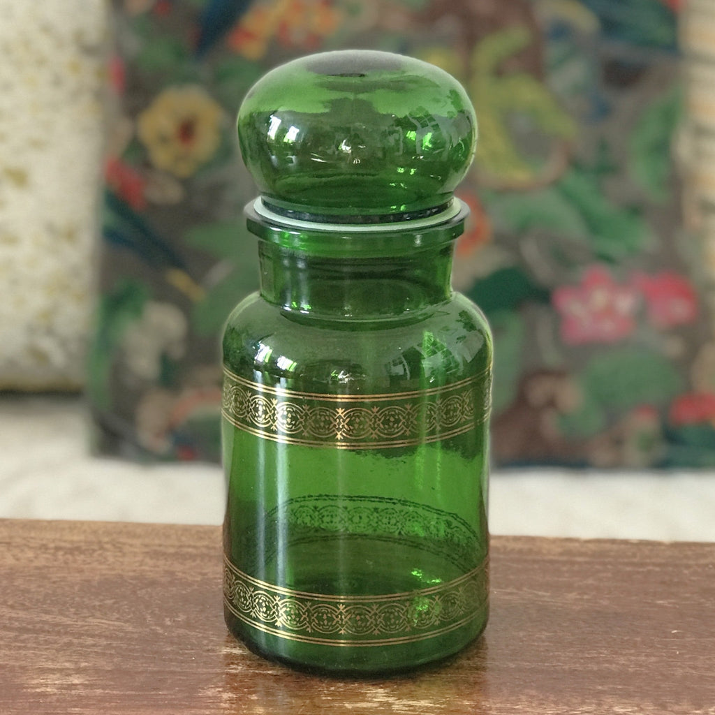 Ancien bocal à café vintage en verre moulé vert et frises imprimées dorées par Hello Broc brocante en ligne