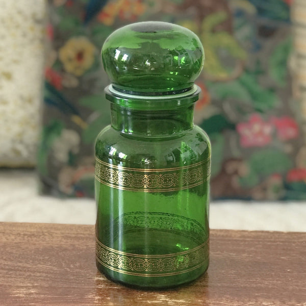 Ancien bocal à café vintage en verre moulé vert et frises imprimées dorées par Hello Broc brocante en ligne