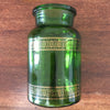 Ancien bocal à café vintage en verre moulé vert et frises imprimées dorées par Hello Broc brocante en ligne