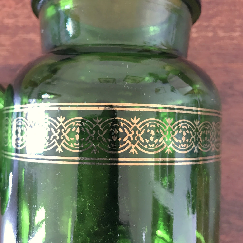 Ancien bocal à café vintage en verre moulé vert et frises imprimées dorées par Hello Broc brocante en ligne