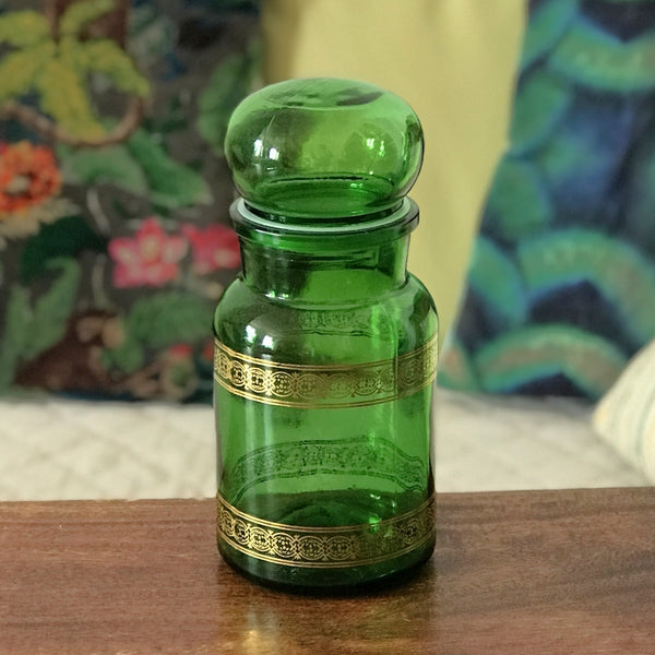 Ancien bocal à café vintage en verre moulé vert et frises imprimées dorées par Hello Broc brocante en ligne