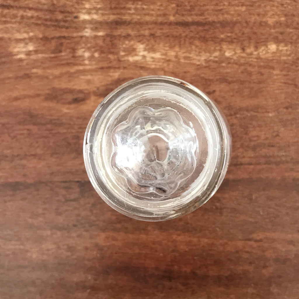 Bocal ancien en verre soufflé avec couvercle au bouton de préhension rond début XXème siècle par Hello Broc brocante en ligne