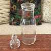 Bocal ancien en verre soufflé avec couvercle au bouton de préhension rond début XXème siècle par Hello Broc brocante en ligne