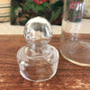 Bocal ancien en verre soufflé avec couvercle au bouton de préhension rond début XXème siècle par Hello Broc brocante en ligne