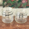 Lot de 2 bocaux de conservation anciens en verre moulé Le Pratique contenance 0,5 Litre par Hello Broc brocante en ligne