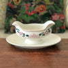 Saucière sur piédouche Digoin Sarreguemines décor Printemps par Hello Broc brocante en ligne
