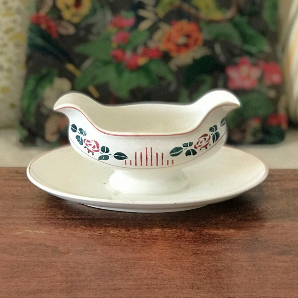 Saucière sur piédouche Digoin Sarreguemines décor Printemps par Hello Broc brocante en ligne