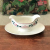 Saucière sur piédouche Digoin Sarreguemines décor Printemps par Hello Broc brocante en ligne