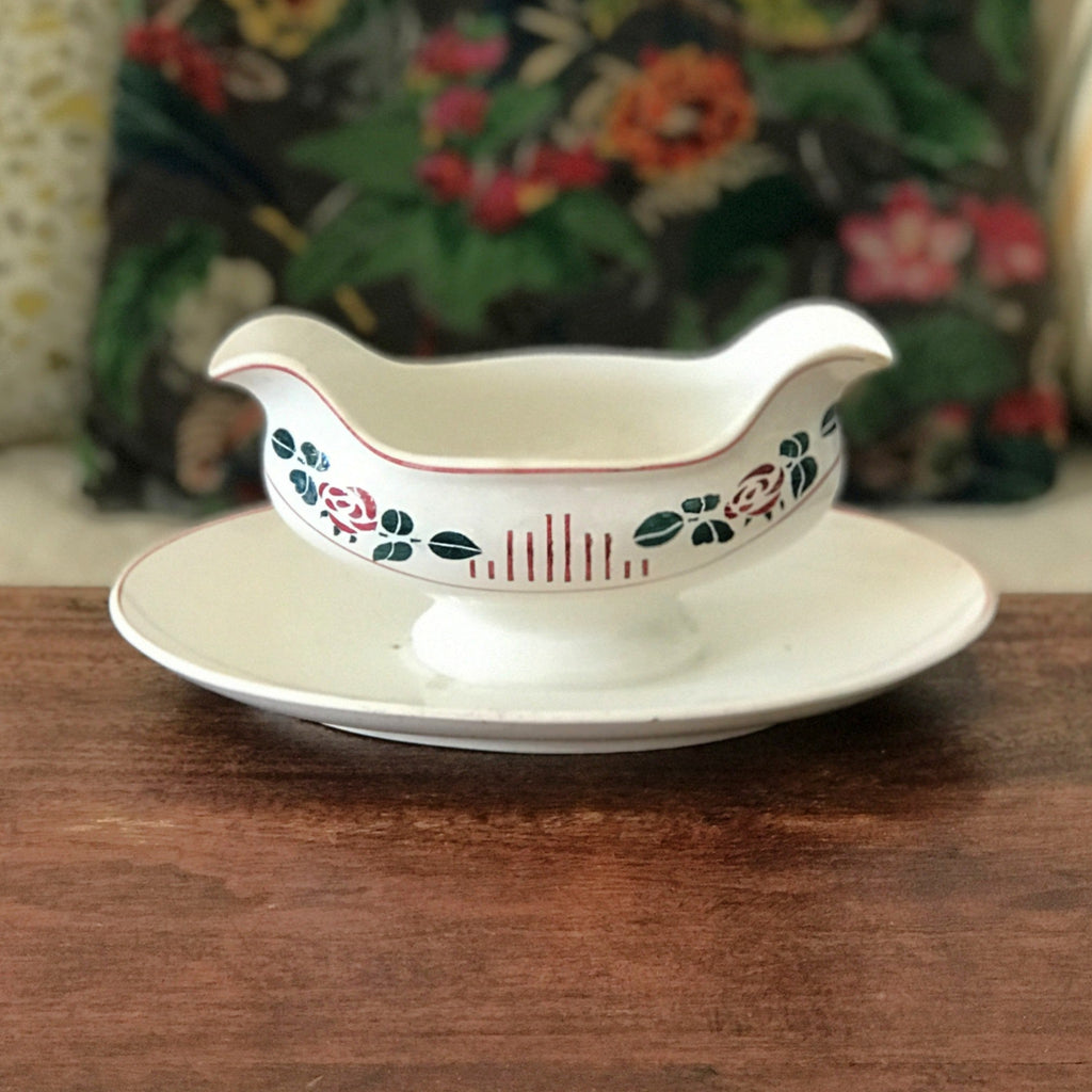 Saucière sur piédouche Digoin Sarreguemines décor Printemps par Hello Broc brocante en ligne