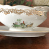Saucière en porcelaine du Berry décor frises dorées et illustration calèche par Hello Broc brocante en ligne