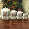 Ensemble de 4 pots à épices en faïence fine et décor fleurs multicolores Circa 1930 par Hello Broc brocante en ligne