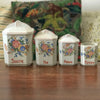 Ensemble de 4 pots à épices en faïence fine et décor fleurs multicolores Circa 1930 par Hello Broc brocante en ligne