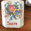 Ensemble de 4 pots à épices en faïence fine et décor fleurs multicolores Circa 1930 par Hello Broc brocante en ligne