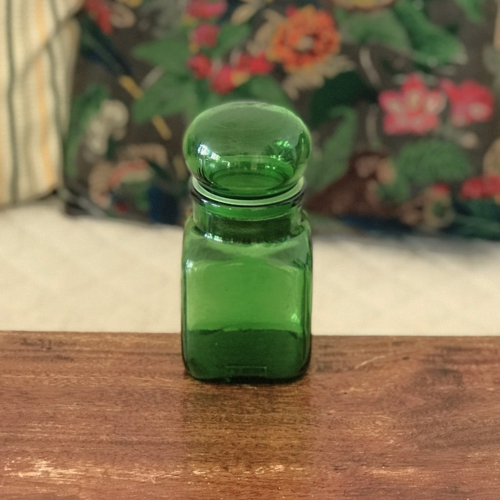 Petit bocal publicitaire Ariel en verre moulé vert années 60 par Hello Broc brocante en ligne