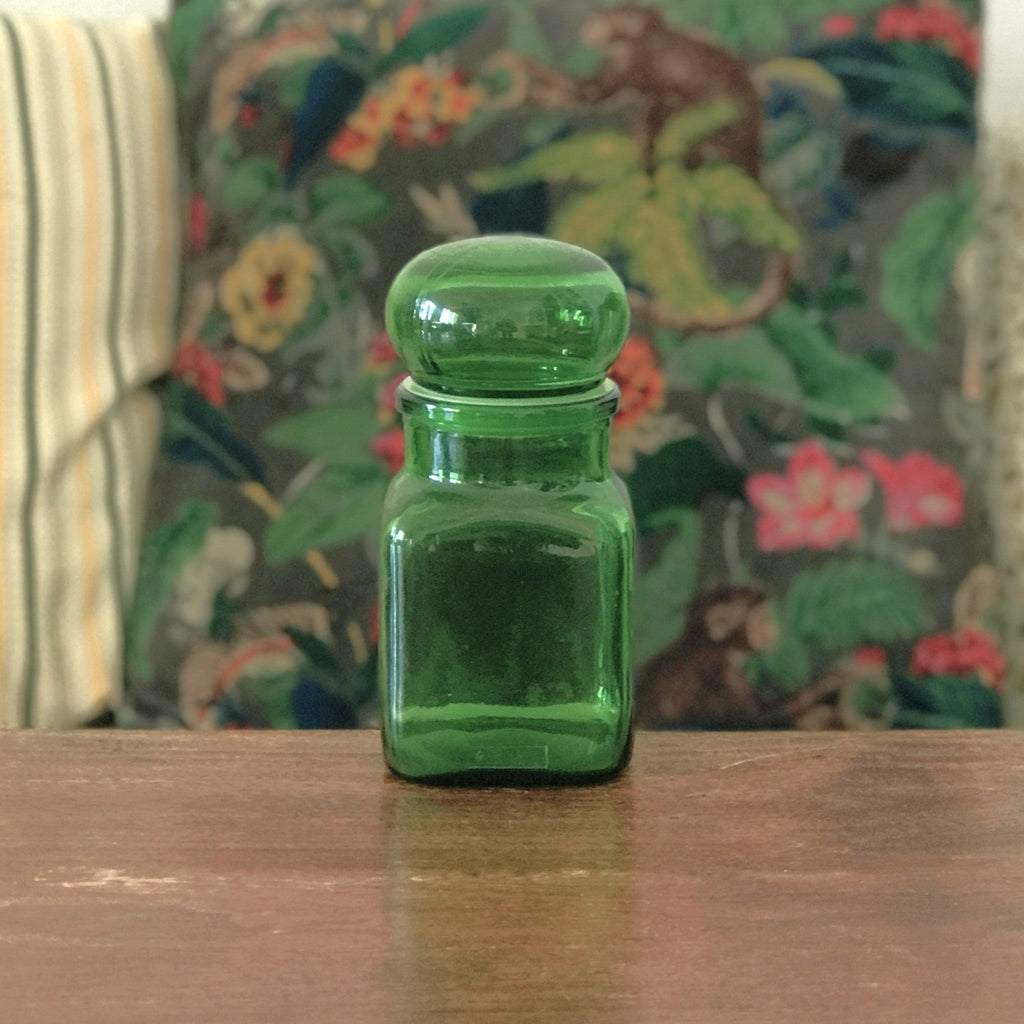 Petit bocal publicitaire Ariel en verre moulé vert années 60 par Hello Broc brocante en ligne